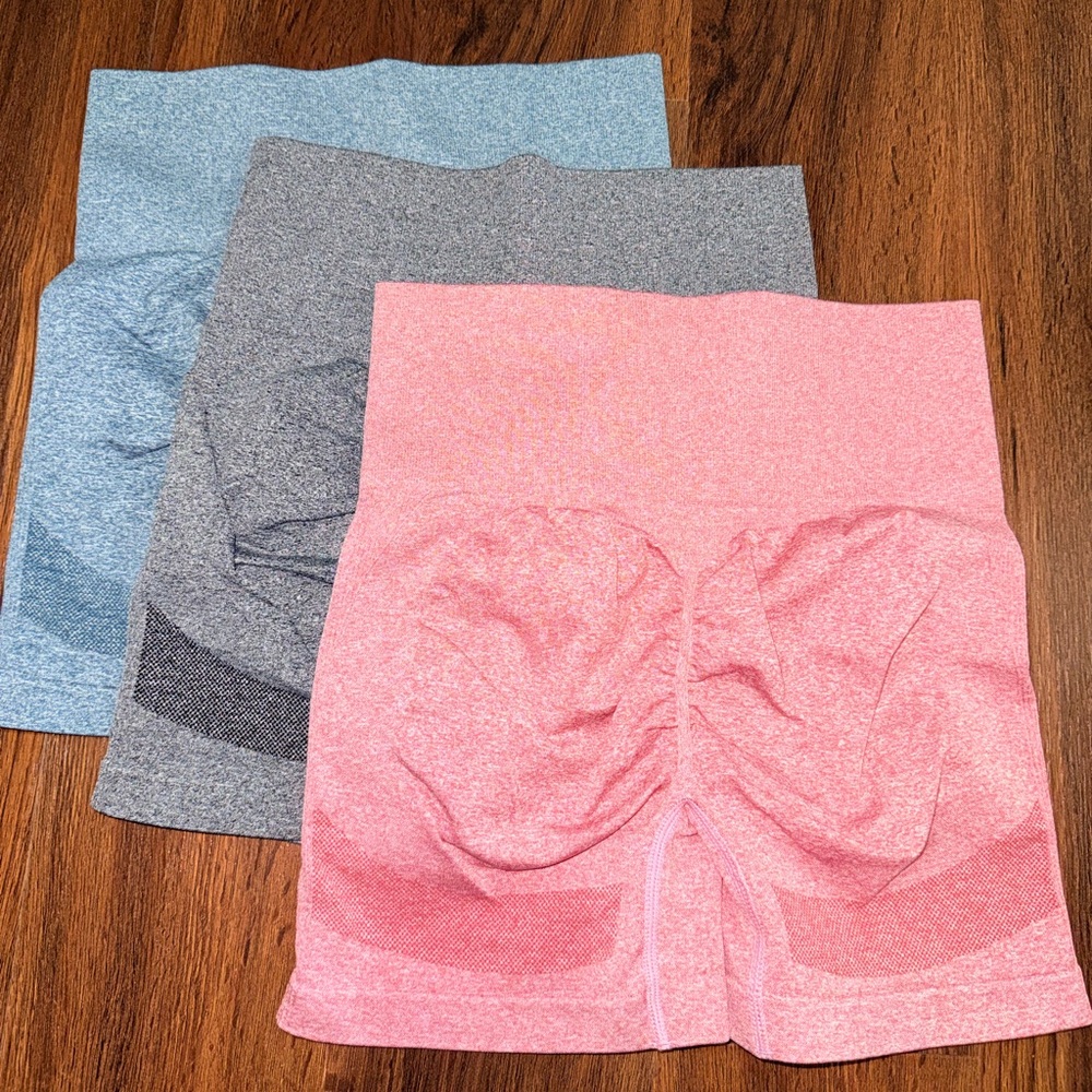 3 workout shorts blue green and red